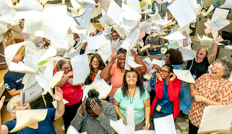 eBizDocs employees saying goodbye to paper
